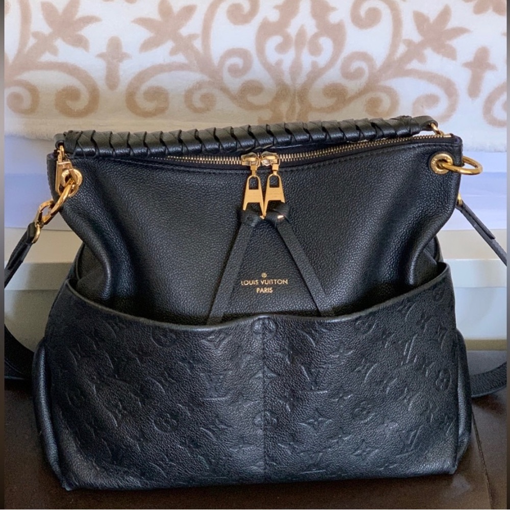 COPY - Authentic Lois Vuitton Maida Hobo .  No longer available in store.